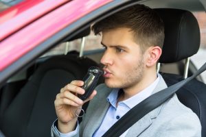 man doing breath test